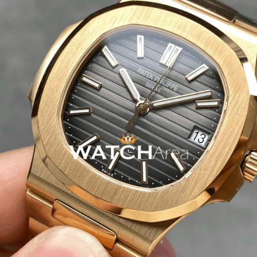 Patek Philippe - Nautilus - Black Dial - Gold Strap 2