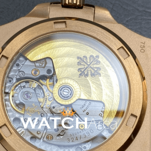 Patek Philippe - Nautilus - Black Dial - Gold Strap 5